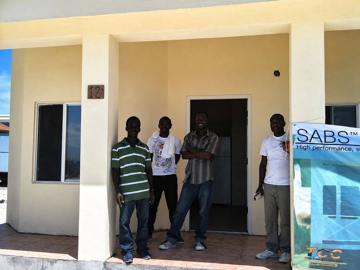 Local crew at a completed SABS home — Haiti 2011